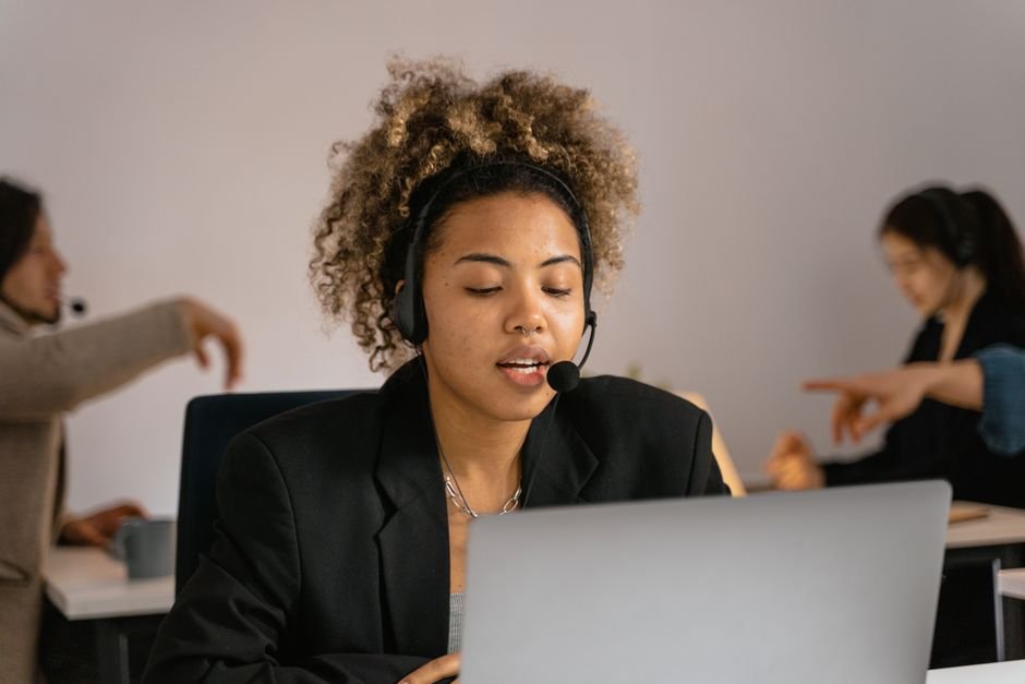 Support agent wearing a headset